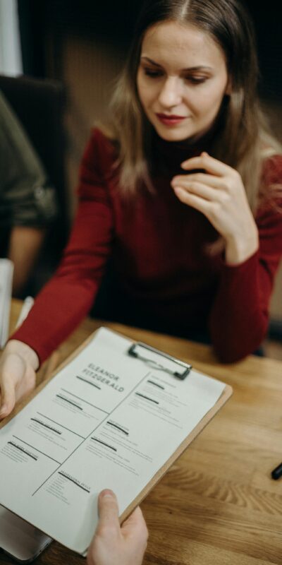 Woman Holding Clipboard